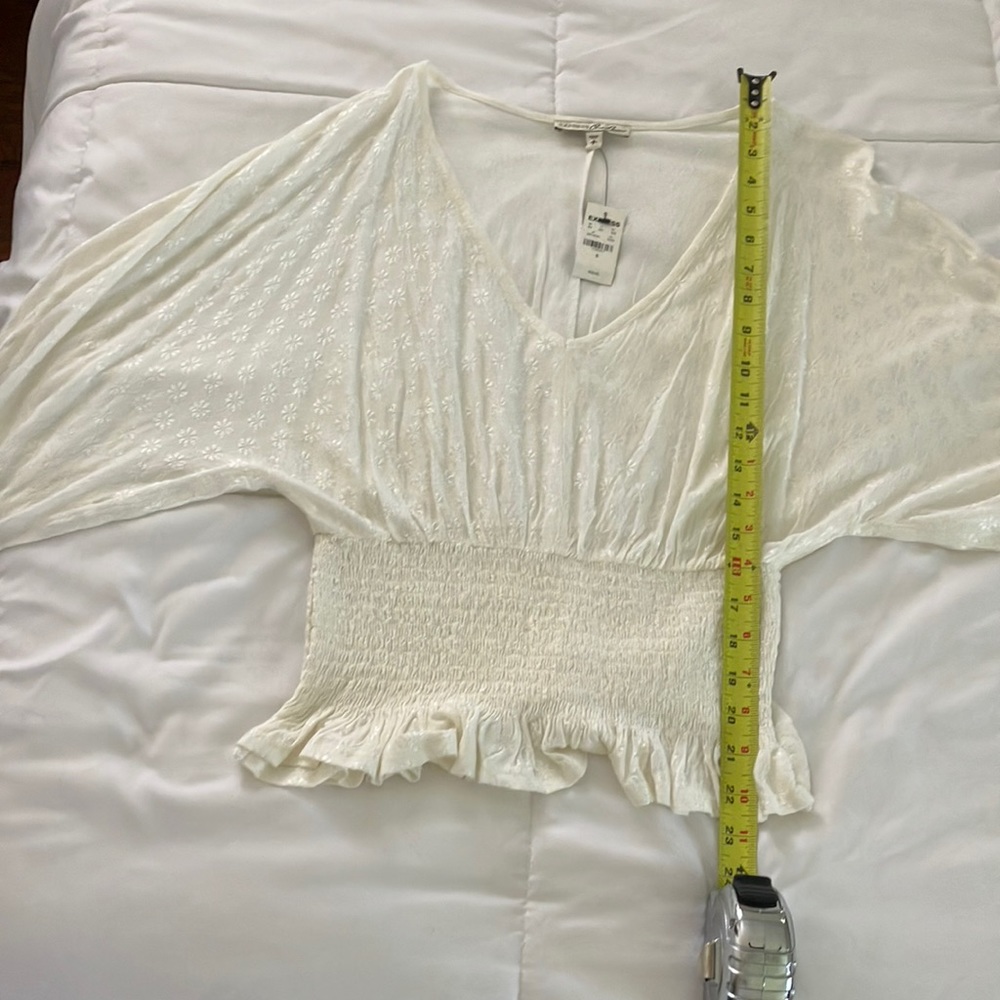 Express cream colored top size small NEW